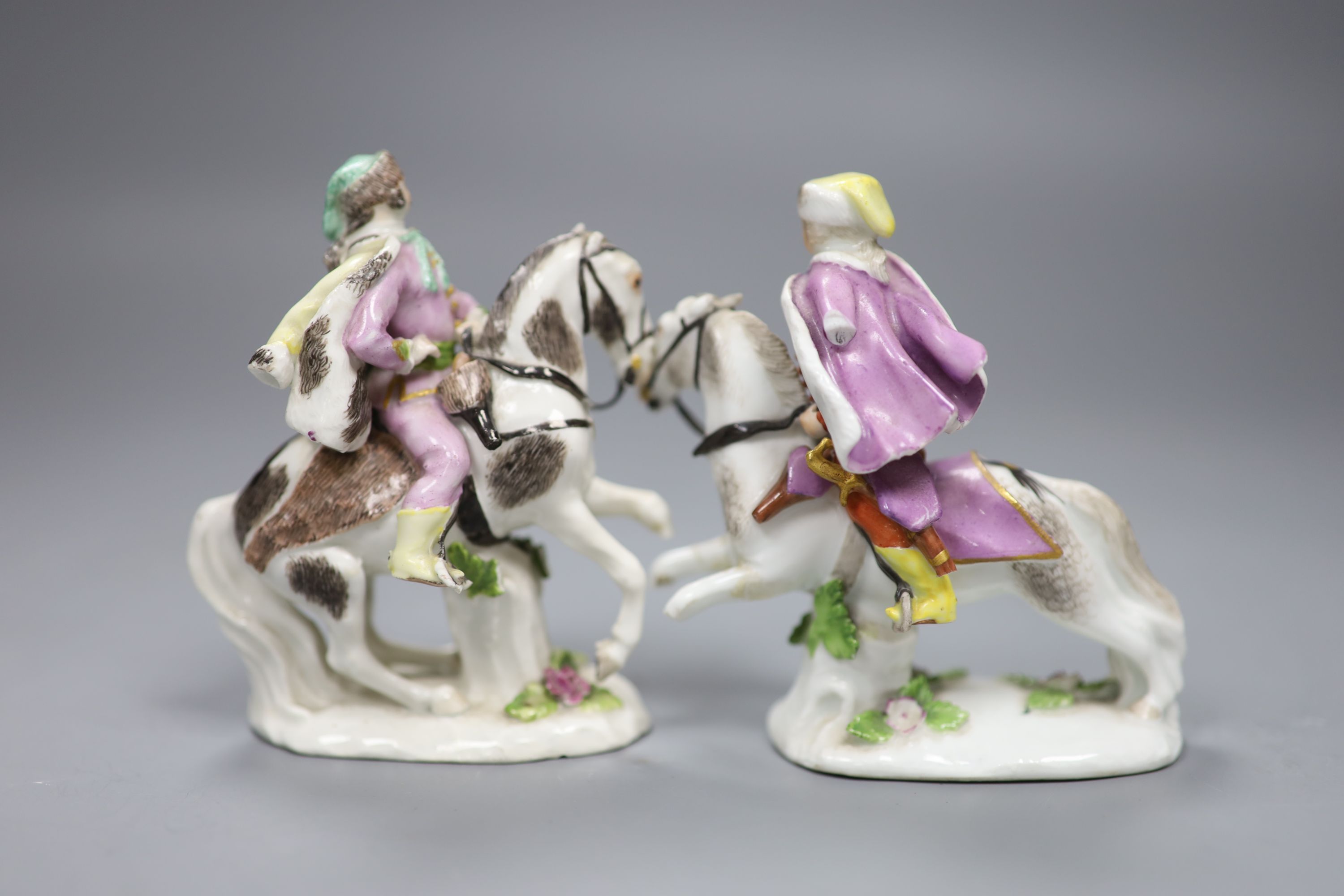 A pair of Meissen equestrian hunting figures, mid 18th century, 9cm